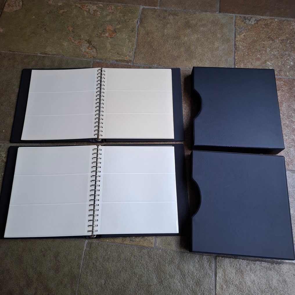 Accessori  - 2 album Lindner-T di lusso (nero), ognuno con fogli a doppia faccia a 3 scomparti (20×), come nuovi. #1.0