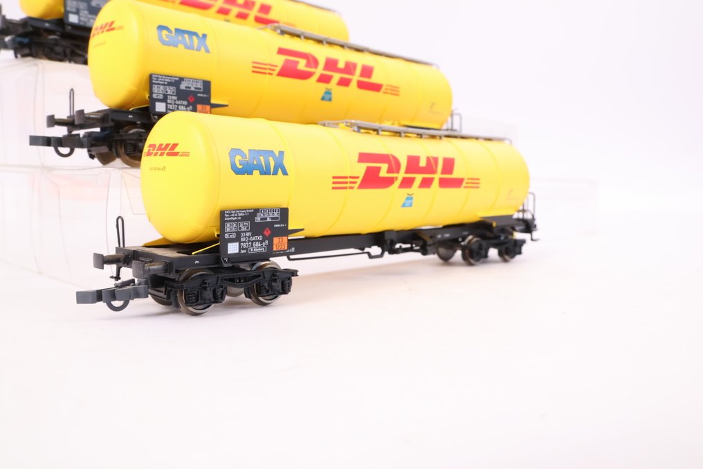 Piko H0 - Machetă tren transport marfă (3) - Trei vagoane-cisternă 'DHL'. - GATX #1.0