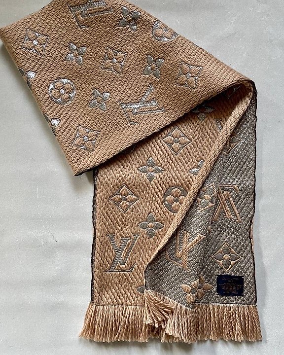 At Auction: A ladies Louis Vuitton scarf.