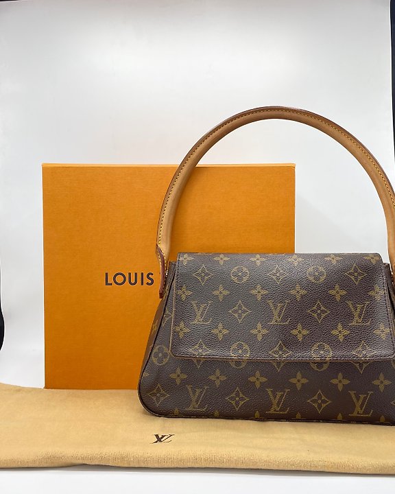 Sold at Auction: Louis Vuitton, Louis Vuitton Damier Ebene Canvas Geronimos  Sling Bag