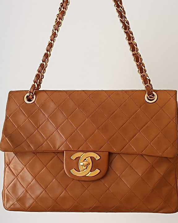 Sold at Auction: Chanel: A brown small flap bag