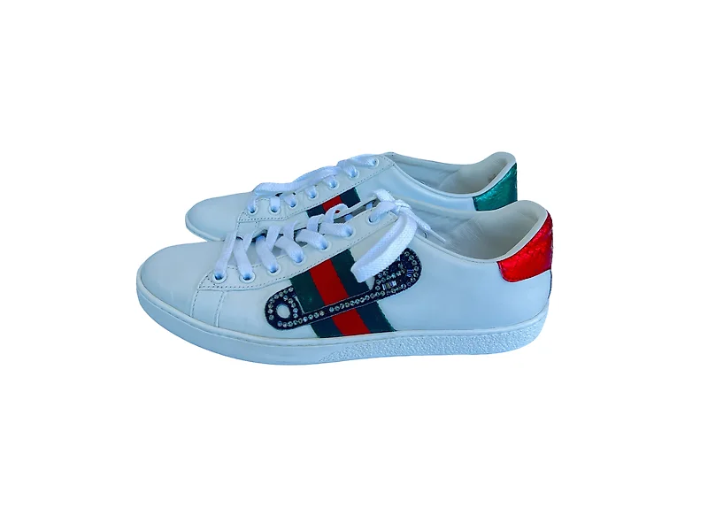 Koop Christian Louboutin rode sneakers online Catawiki