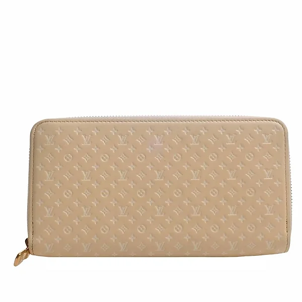 LOUIS VUITTON, Koala, wallet with monogram pattern, buckle in yellow  metal. Vintage Clothing & Accessories - Auctionet