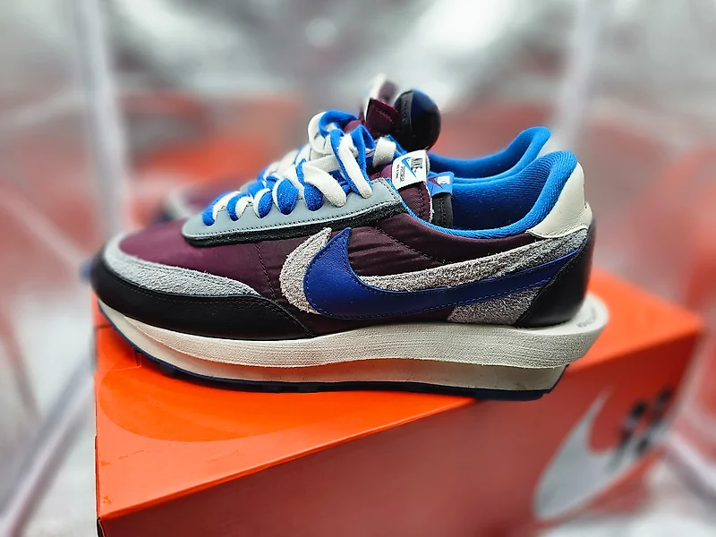 Paarse nike sales schoenen