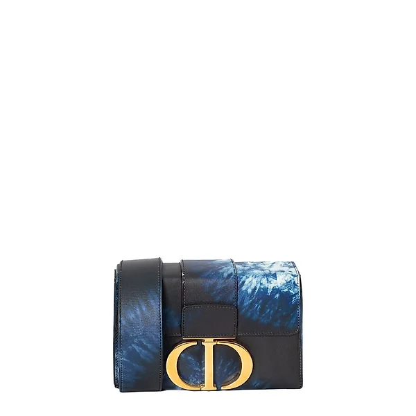 Sold at Auction: Christian Dior - a saddle pochette in blue