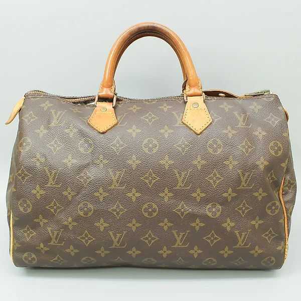 Sold at Auction: A Louis Vuitton Stratos monogram print and