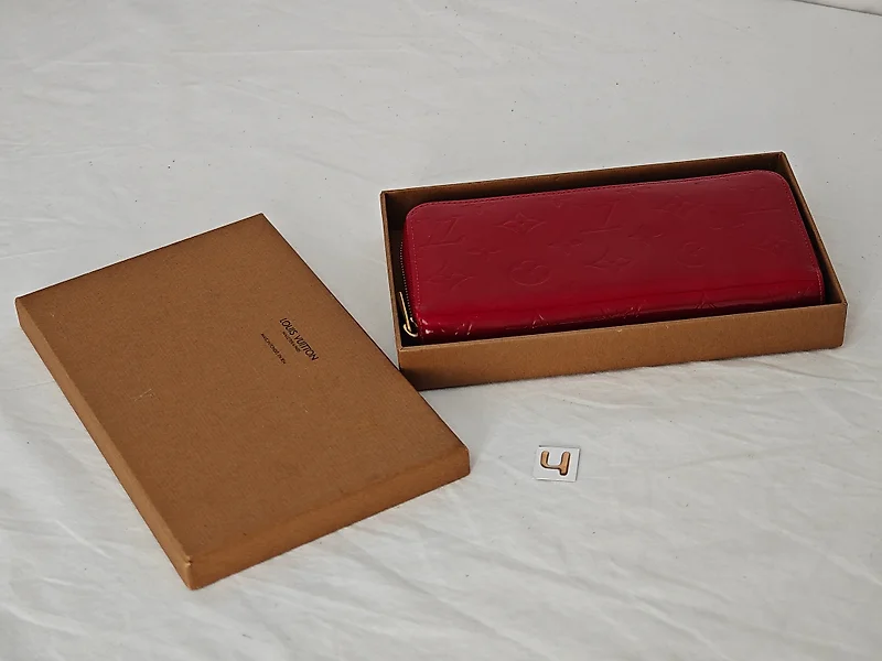 At Auction: Louis Vuitton, Louis Vuitton Red Epi Leather Elise Wallet