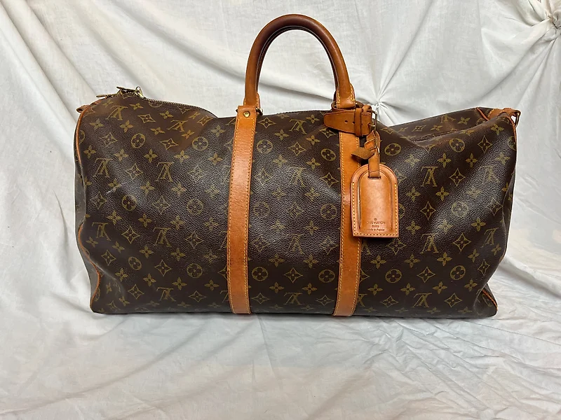 Sold at Auction: C. 1980'S LOUIS VUITTON MONOGRAM KEEPALL 60 DUFFEL