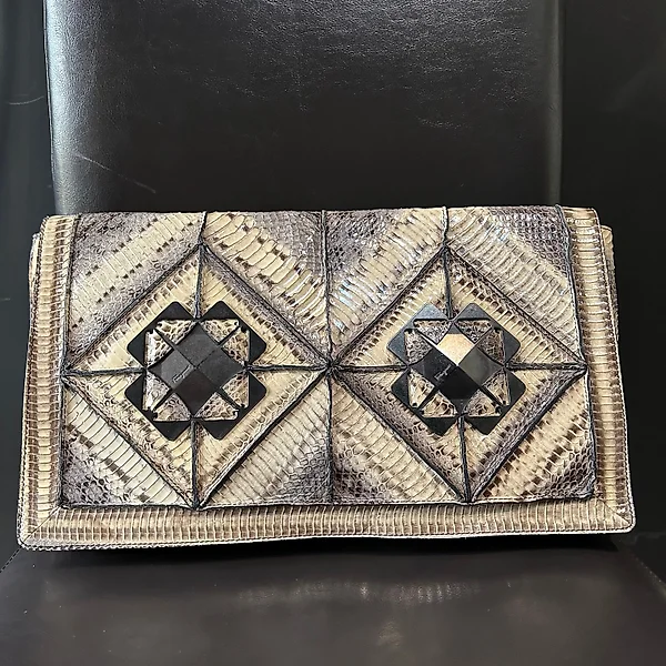 Salvatore Ferragamo Clutch bag. Buy unique objects. Now at auction for sale Catawiki