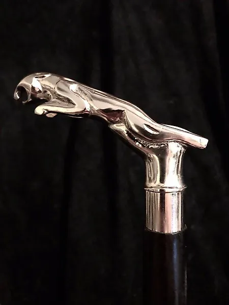 Walking stick - A very elegant and classy JAGUAR car walking stick , handle with silvered bronze Jaguar handle, with - enamelled iron