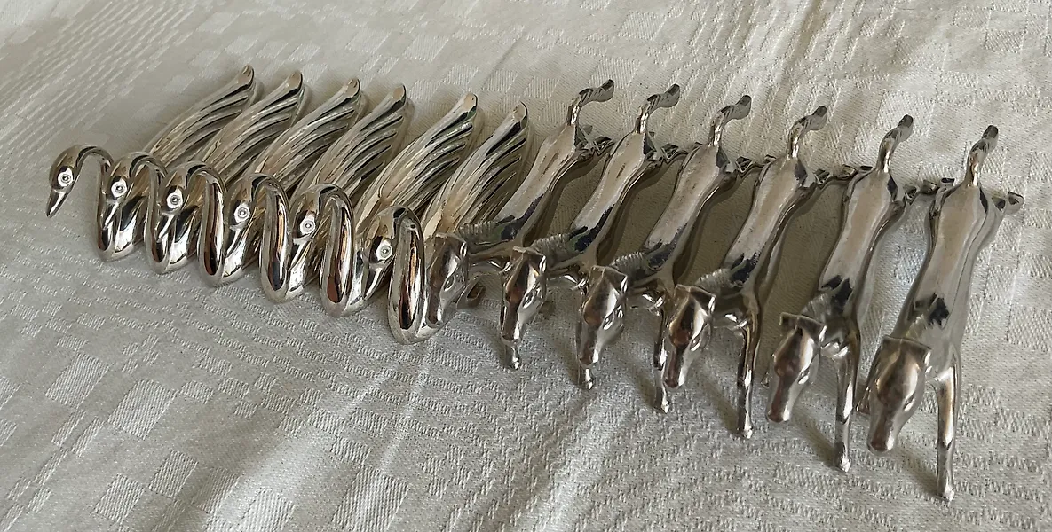 Knife rest (12) - Messenleggers renpaarden en zwanen - Silverplated