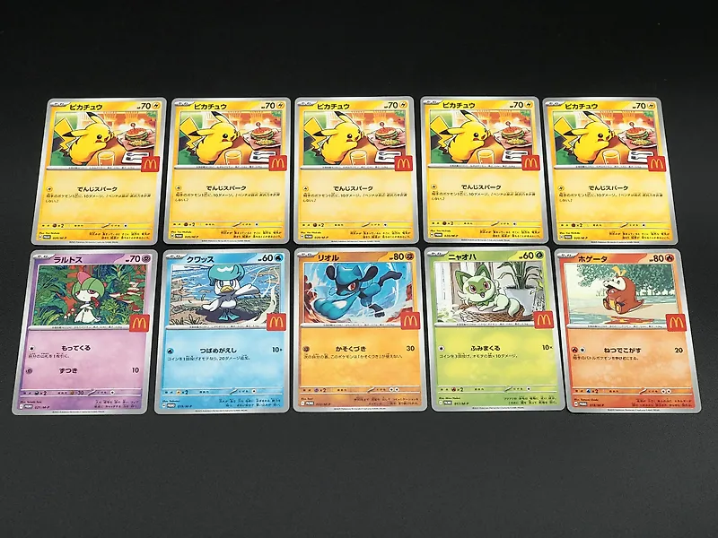 Pokémon - 10 Card - Pikachu x5, Sprigatito, Fuecoco, Quaxly, Ralts, Riolu 017-022/M-P McDonald's Promo card - Mega Evolution