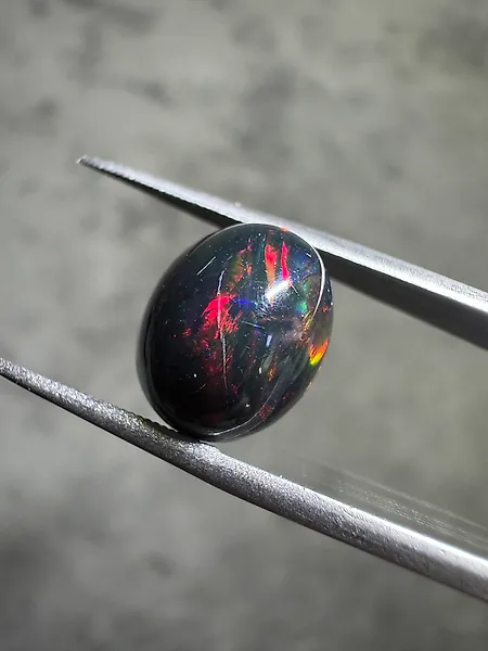 Natural Ethiopian black opal - 3.73 carats Oval cabochon- 0.75 g
