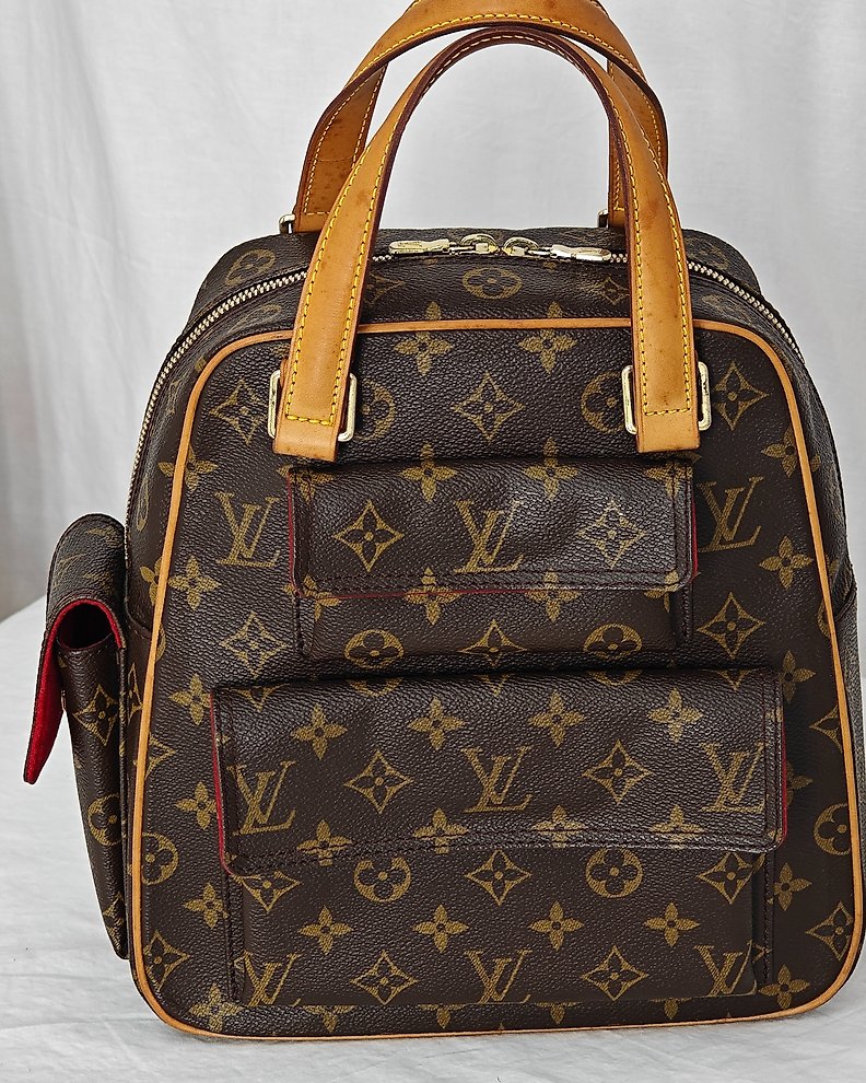 Sold at Auction: Louis Vuitton, Louis Vuitton Monogram Babylone Handbag