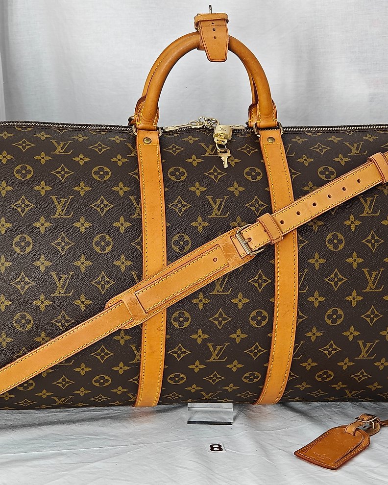 Sold at Auction: Louis Vuitton x Supreme Bandouliere 55 Keepall