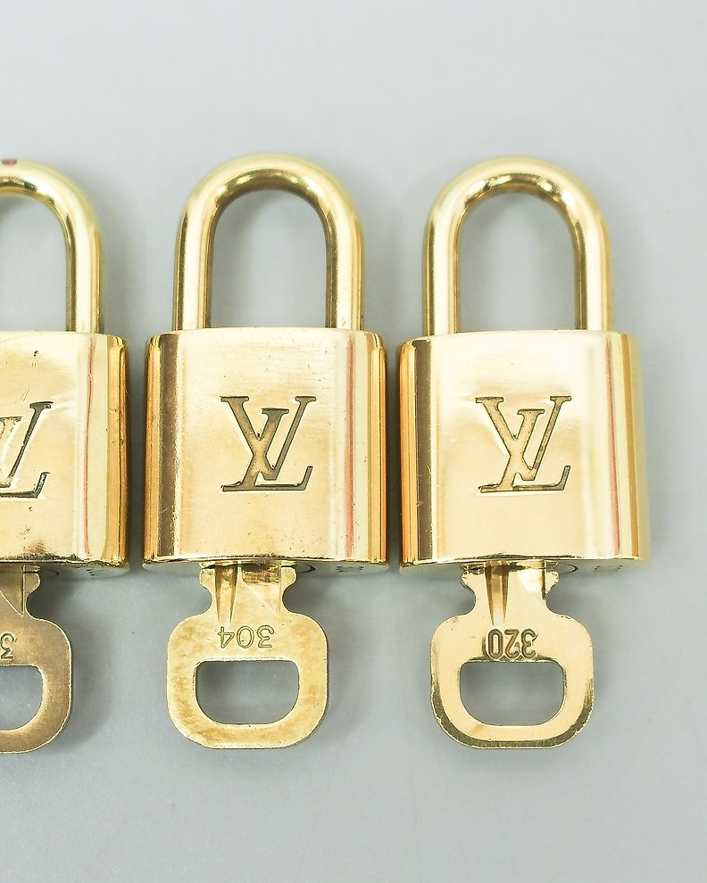 Louis Vuitton - Name Tag Poignet Padlock and Key Set - - Catawiki