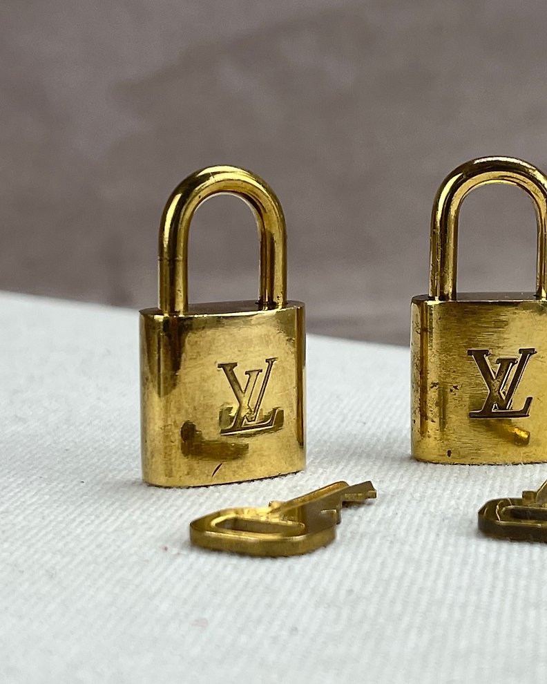 Louis Vuitton, Accessories, Authentic Louis Vuitton Silver Lock And Key  Set