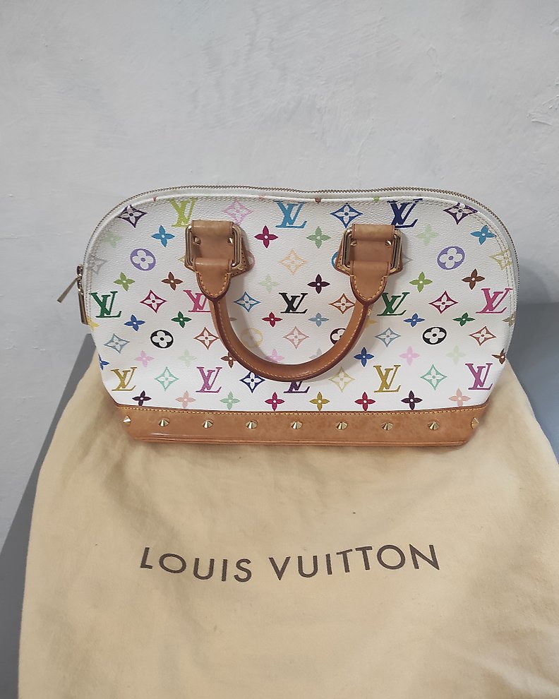 Sold at Auction: Louis Vuitton, Louis Vuitton Alma MM Handbag