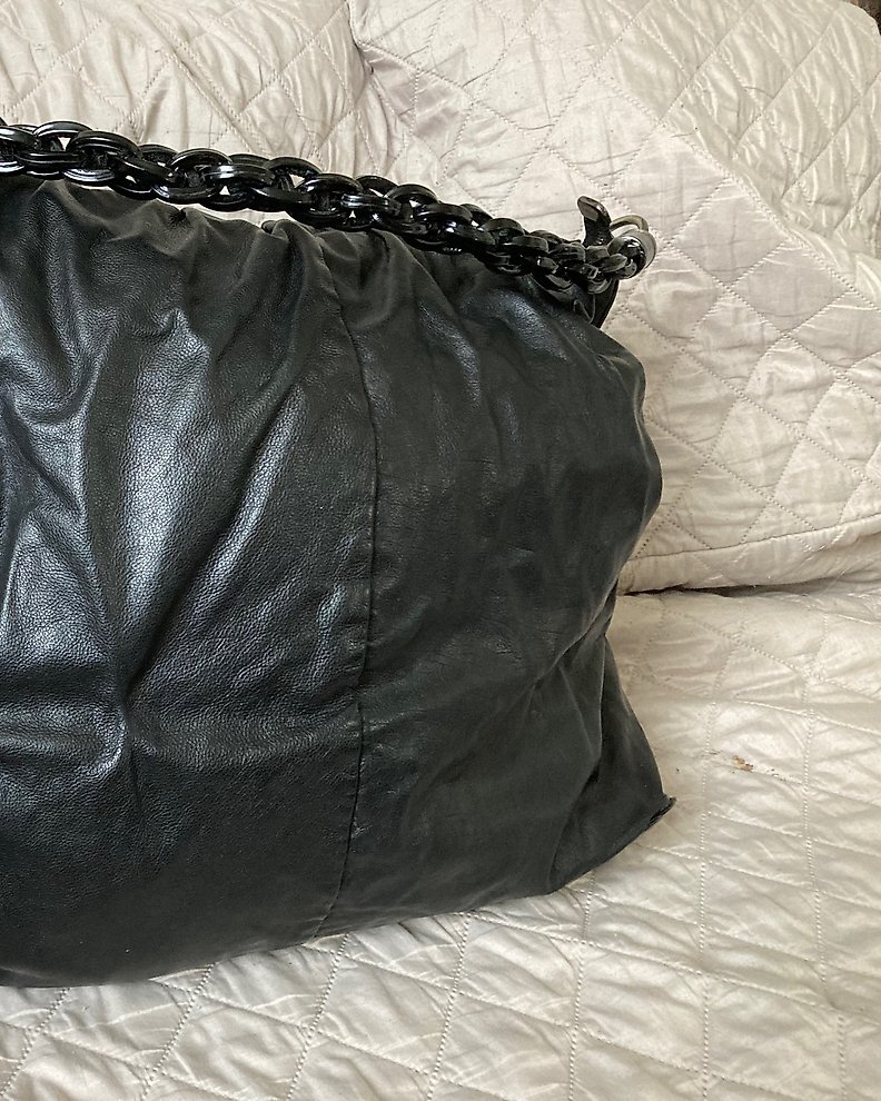 Sold at Auction: Yves Saint Laurent black leather Mombasa sling
