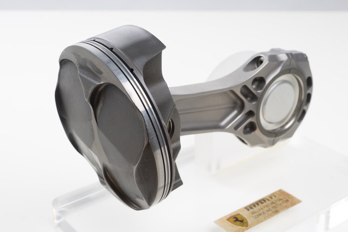 поршень формулы 1. поршень двигателя f1. поршень от болида формула 1. поршень ф1. поршень болида ф1.