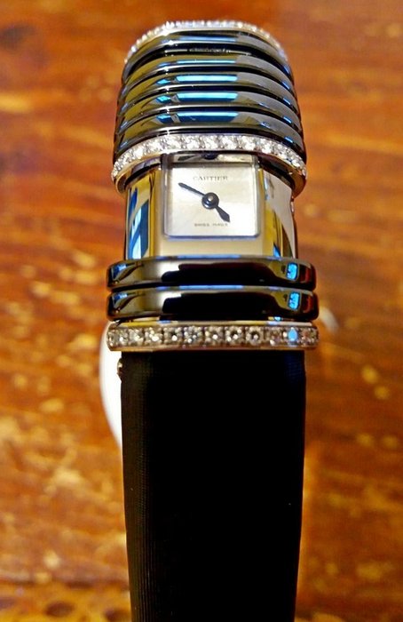Карма ые часы. Cartier Declaration watches. Часы Картье женские. Таинственные часы Картье. Cartier часы желтое золото.