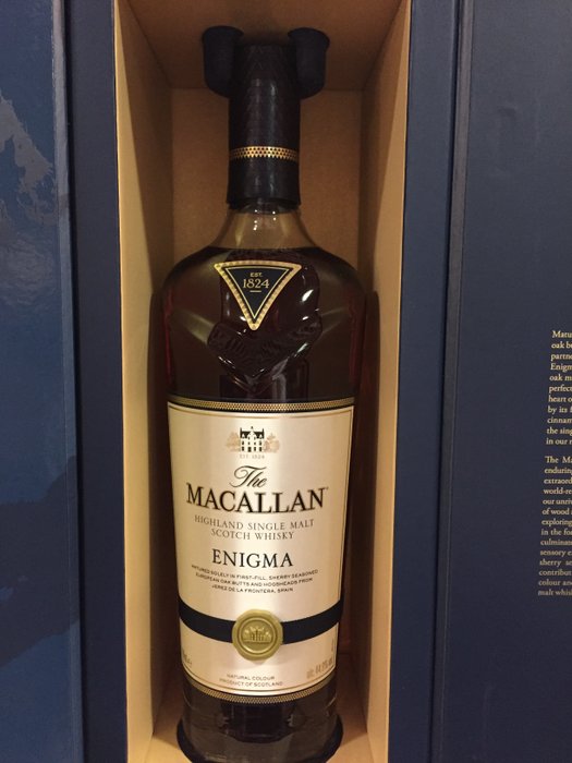 Виски макаллан enigma. Виски макаллан enigma. 7. Macallan enigma пузатая бутылка. Macallan виски enigma.