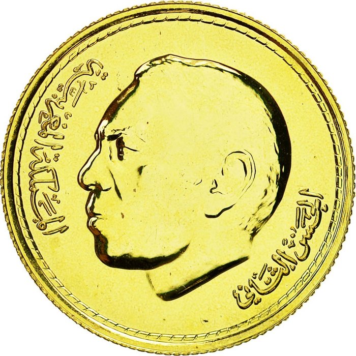 He has a of gold. Gold dirham.