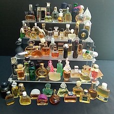 Vintage perfume bottles including Chanel, Jicky, Nina Ricci and