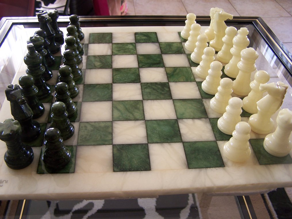 Chiellini chessboard chess pieces. - Catawiki