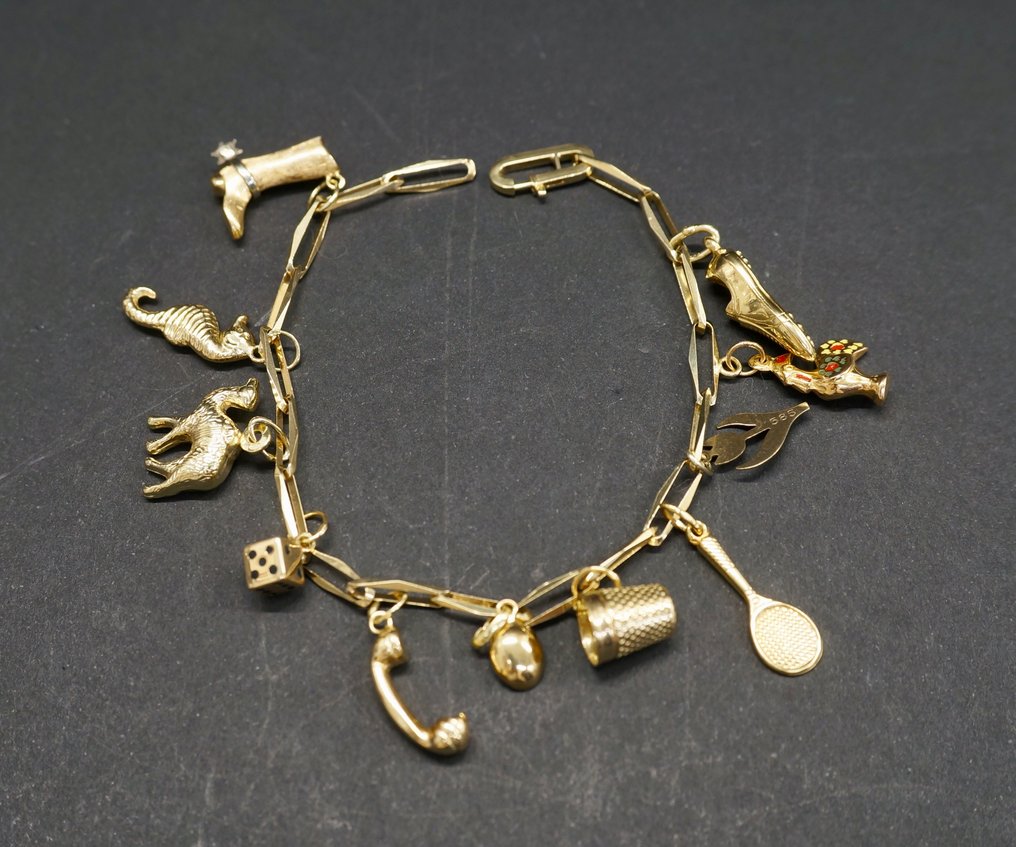 intelligentie Doornen Omgeving Gouden armband met 11 gouden bedels. - Catawiki
