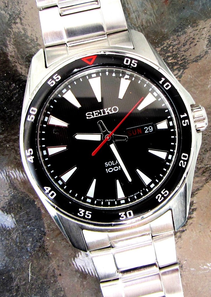 Seiko - Solar SNE393P1 100M Watch Eng. French Day Date - Catawiki