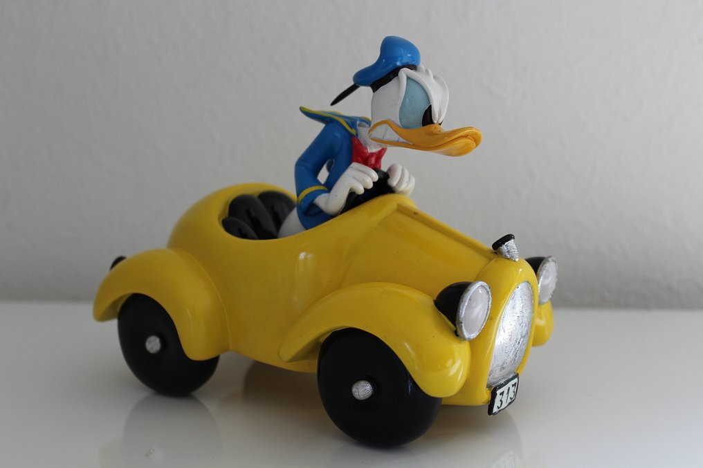 Disney - Boze Donald Duck in zijn gele auto (313) First - Catawiki