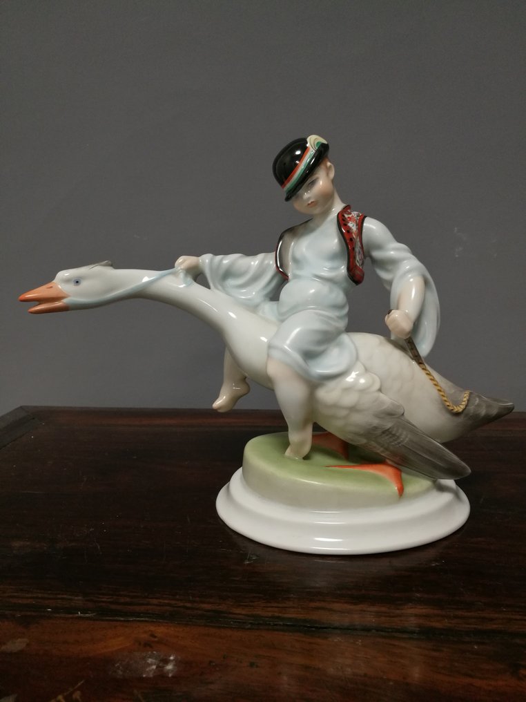Herend - Figurine(s), Boy riding goose - Porcelain - Catawiki