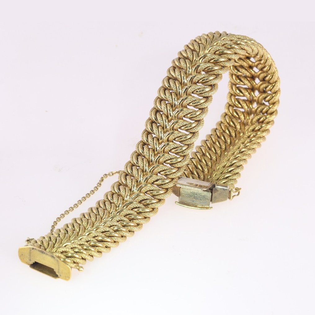 roltrap verbannen PapoeaNieuwGuinea 18 karaat Geel goud - Armband - Gouden armband met dubbele - Catawiki