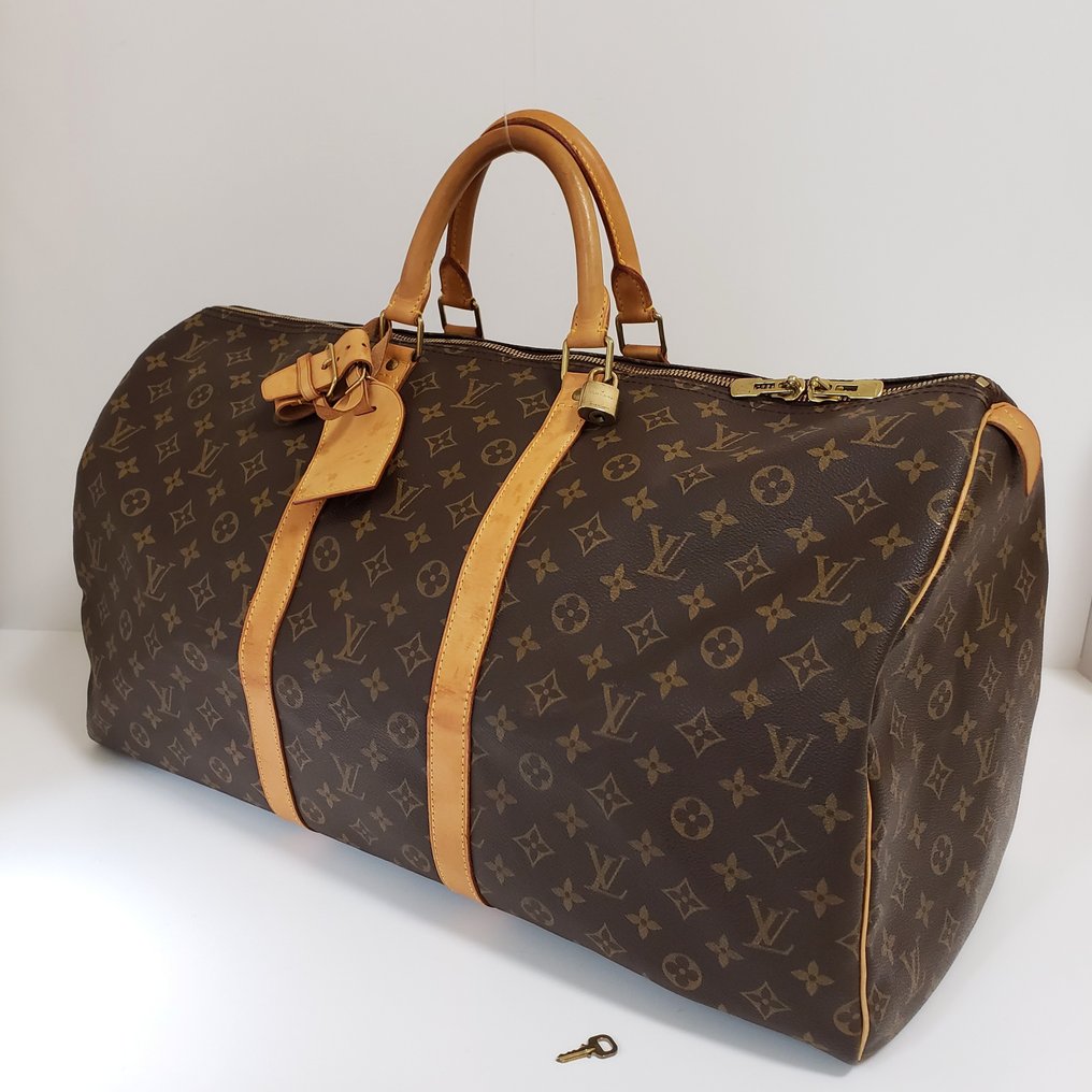 Sold at Auction: Louis Vuitton, Louis Vuitton - City Keepall Bag