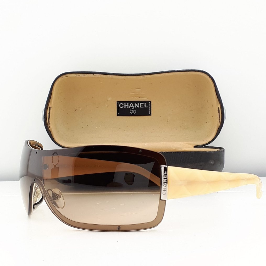Chanel - Shield Brown Frame-Beige with Silver Tone Metal Chanel Plates -  Sunglasses - Catawiki