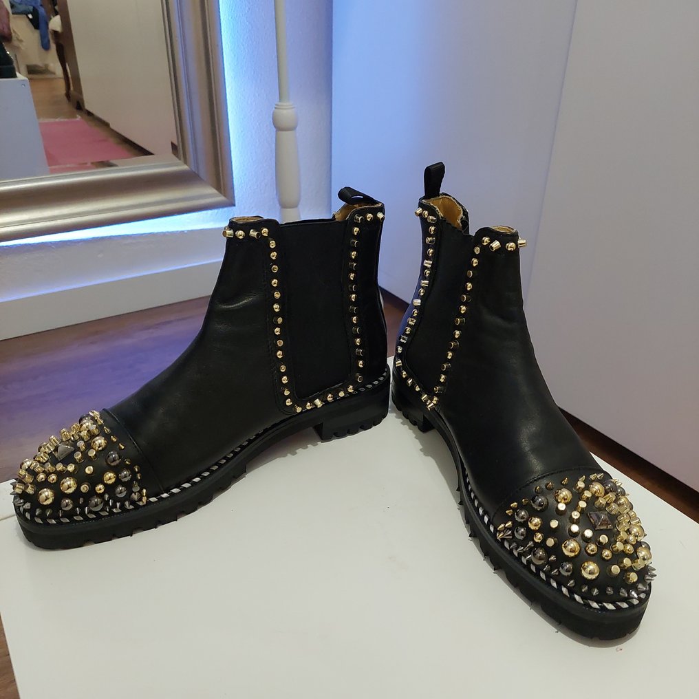 louboutin ankle boots with spikes