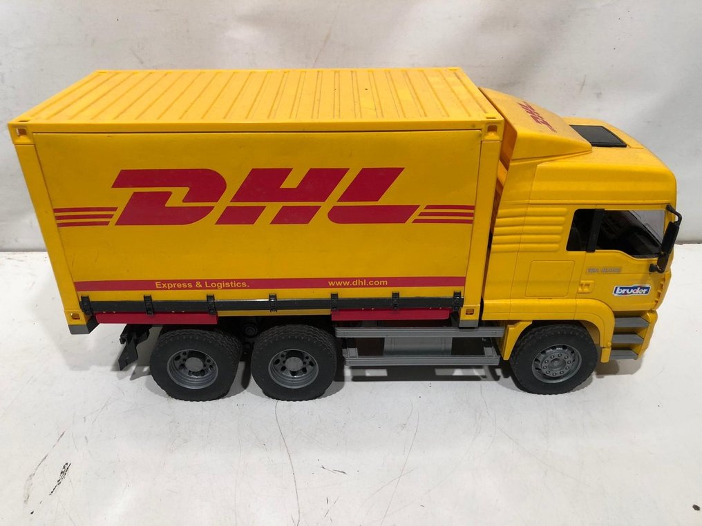 DHL Merchandise figuur (1) - Plastic, Metaal - 1990-2000 - Catawiki