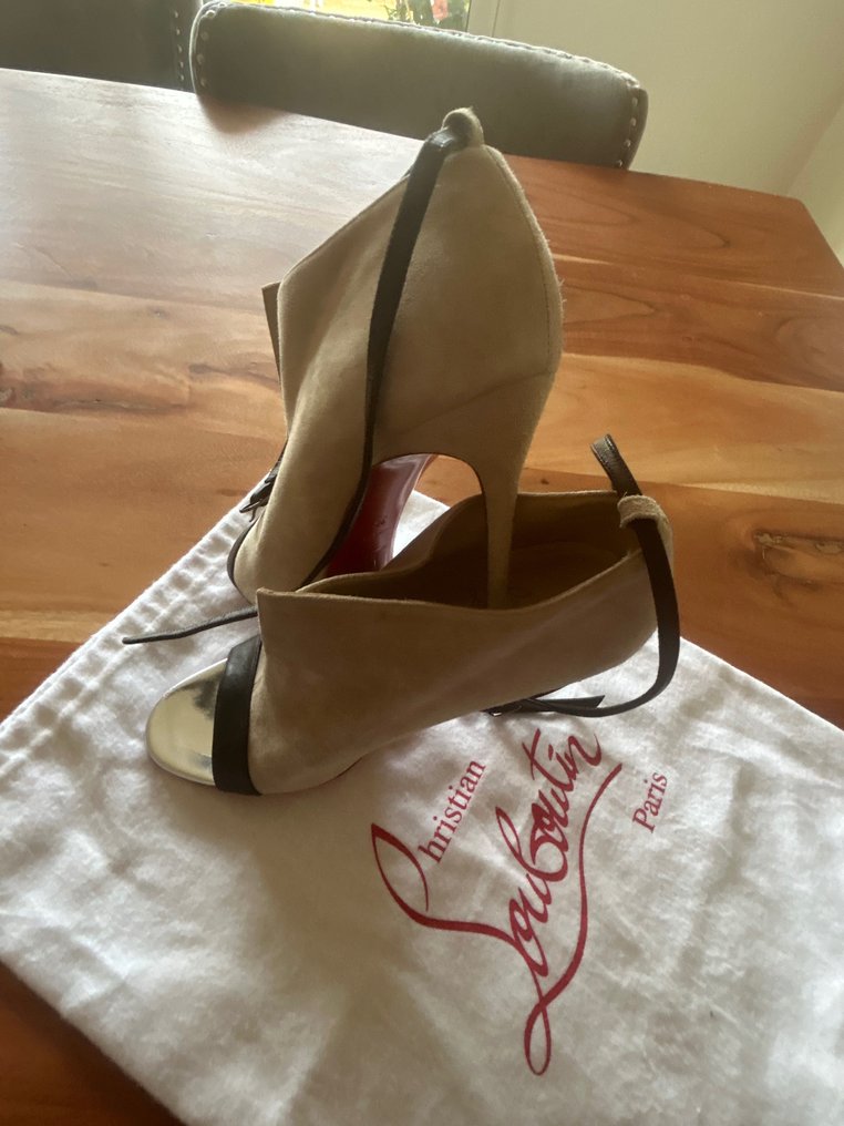 louboutin tape measure heels