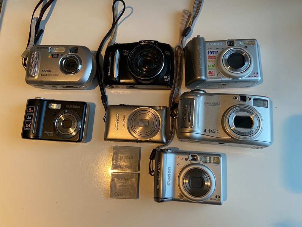Moet vitaliteit Achtervolging 7 collectible cameras : Kodak + Samsung + Canon + Medion - Catawiki