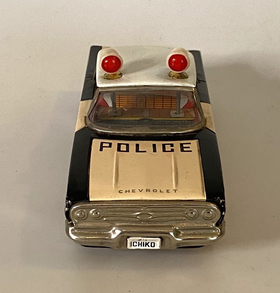 Ichiko Tin toy car Police Chevrolet Impala flywheel drive Catawiki
