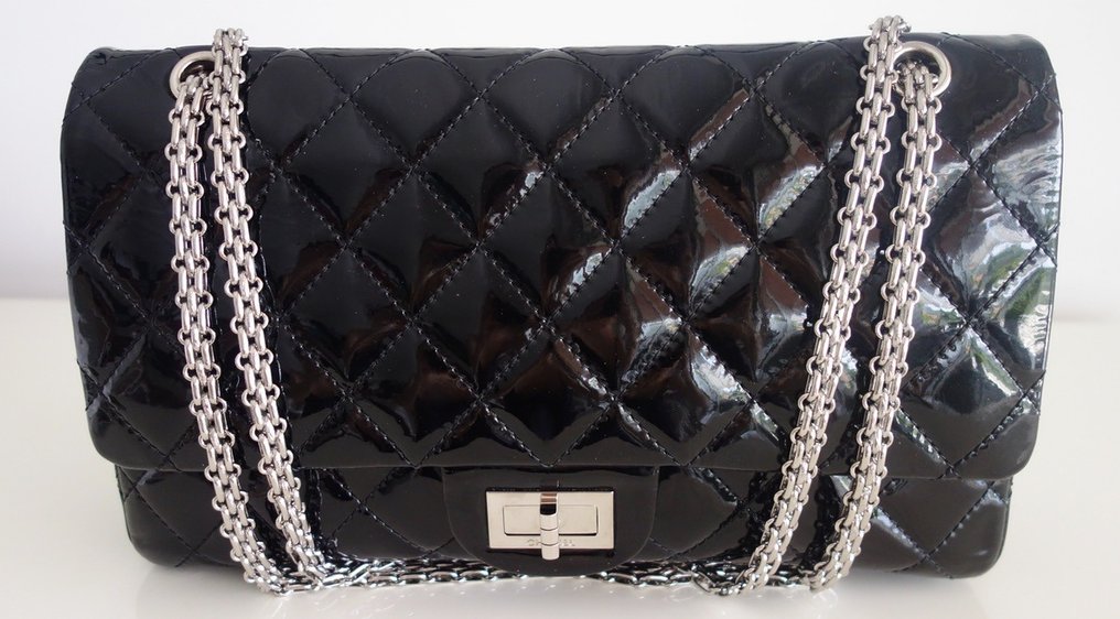 Sold at Auction: CHANEL 2 55 FLAP QUILTED BLACK LEATHER BAG PURSE