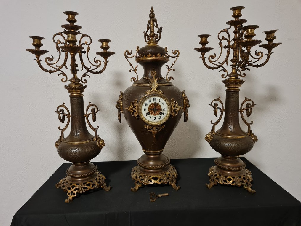 Mantel clock with candlestick Bronze, Leather circa Catawiki