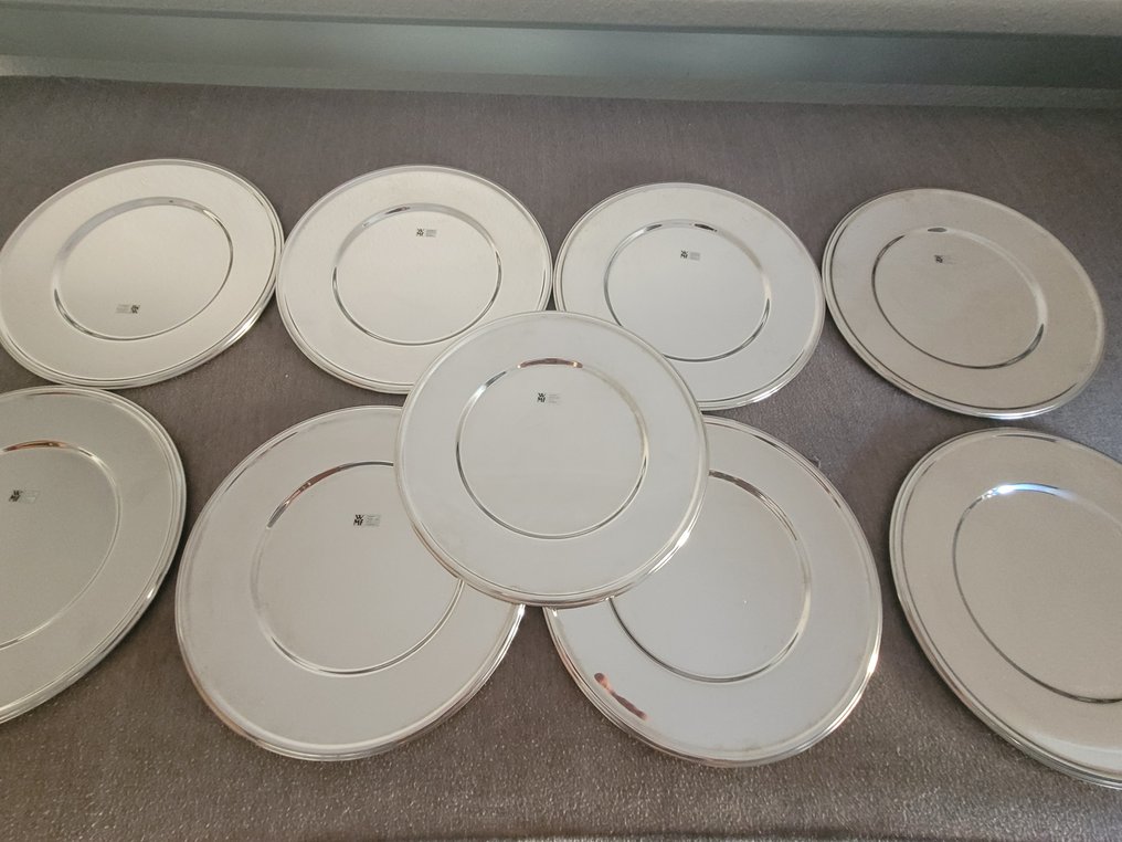 Charger plates (9) stainless steel Wmf Cromargan Catawiki