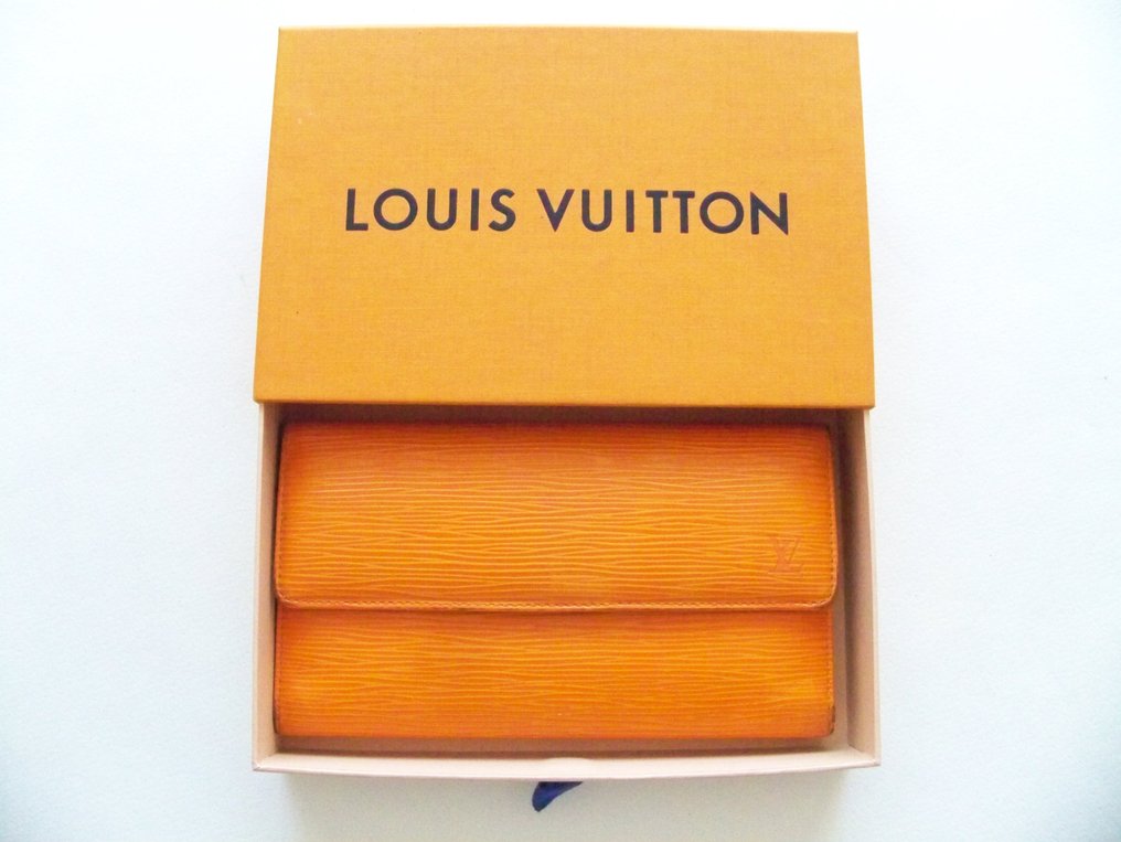 Louis Vuitton - Portefeuille International - Wallet - Catawiki