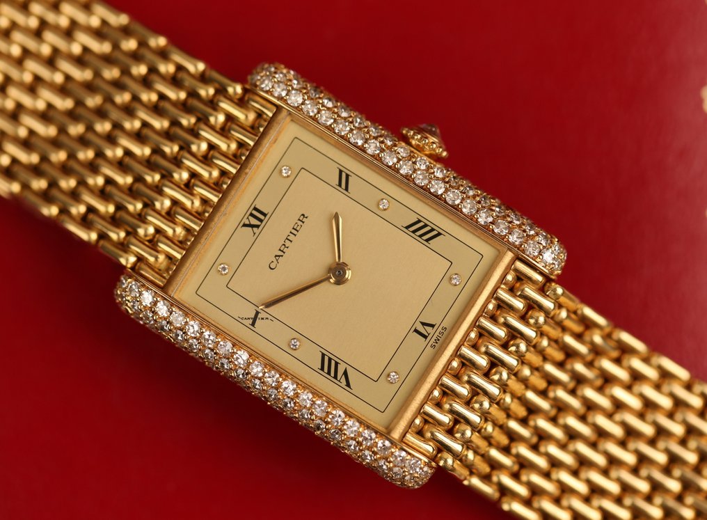 Cartier tank 2025 louis gold bracelet
