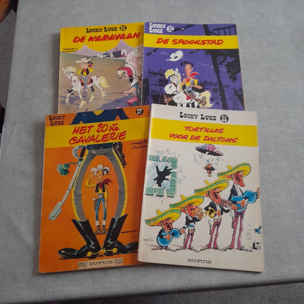 Lucky Luke 24 25 27 31 Softcover Gekleurd Eerste Druk 4 lucky-luke-24-25-27-31-softcover-gekleurd-eerste-druk-4