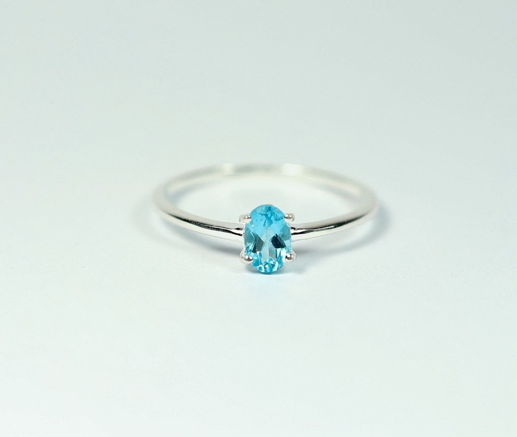 Neon blue top apatite ring