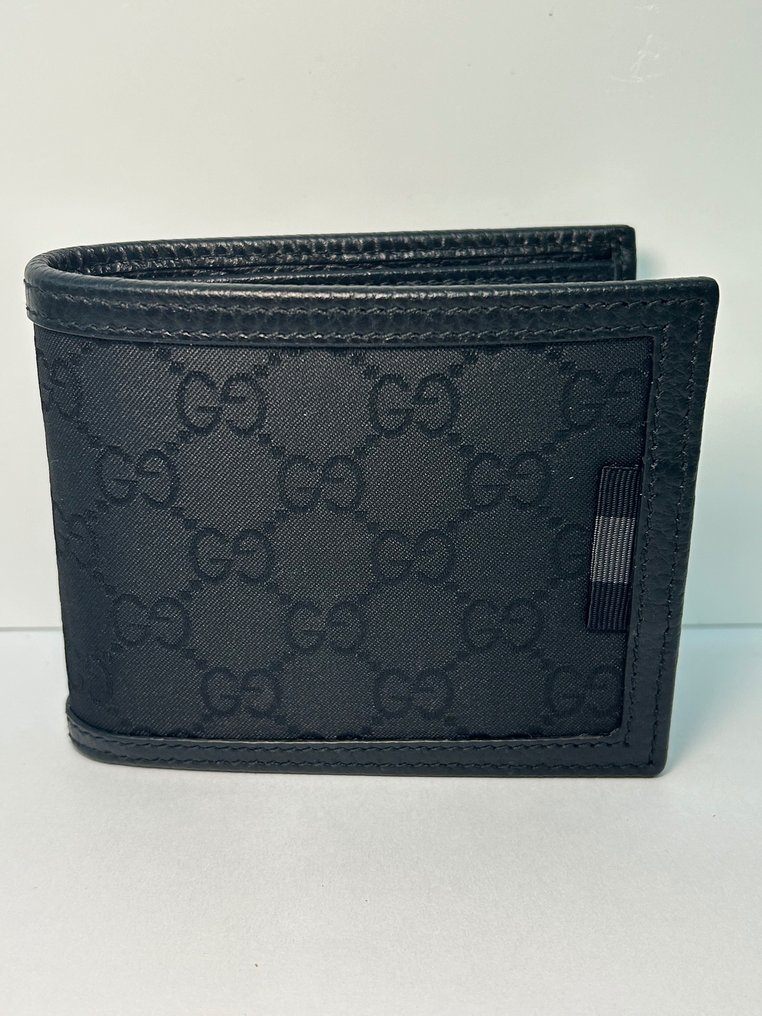 Gucci Bi fold wallet Catawiki