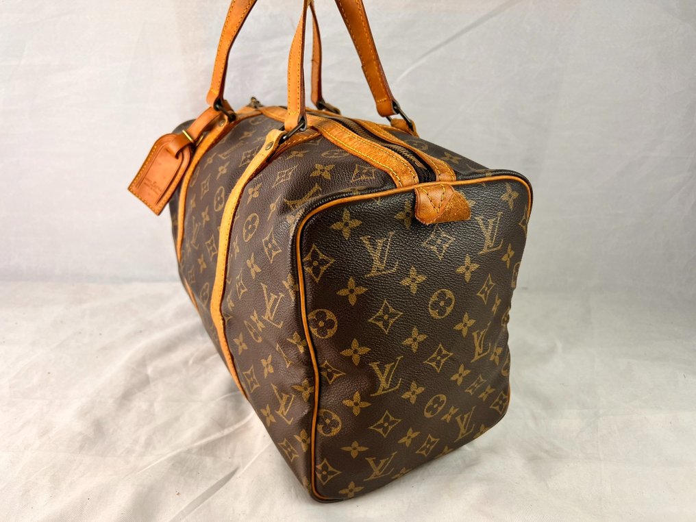 Louis Vuitton sac souple Handbag Catawiki